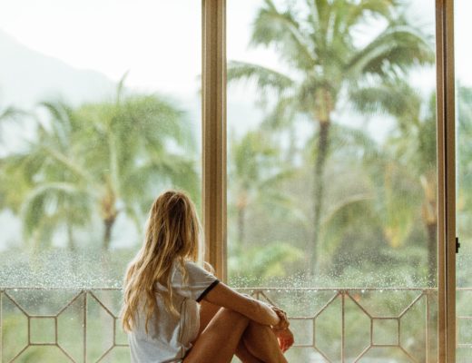 Finding help woman sits near window