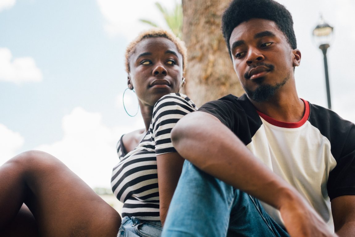 Upset Man and woman sit together